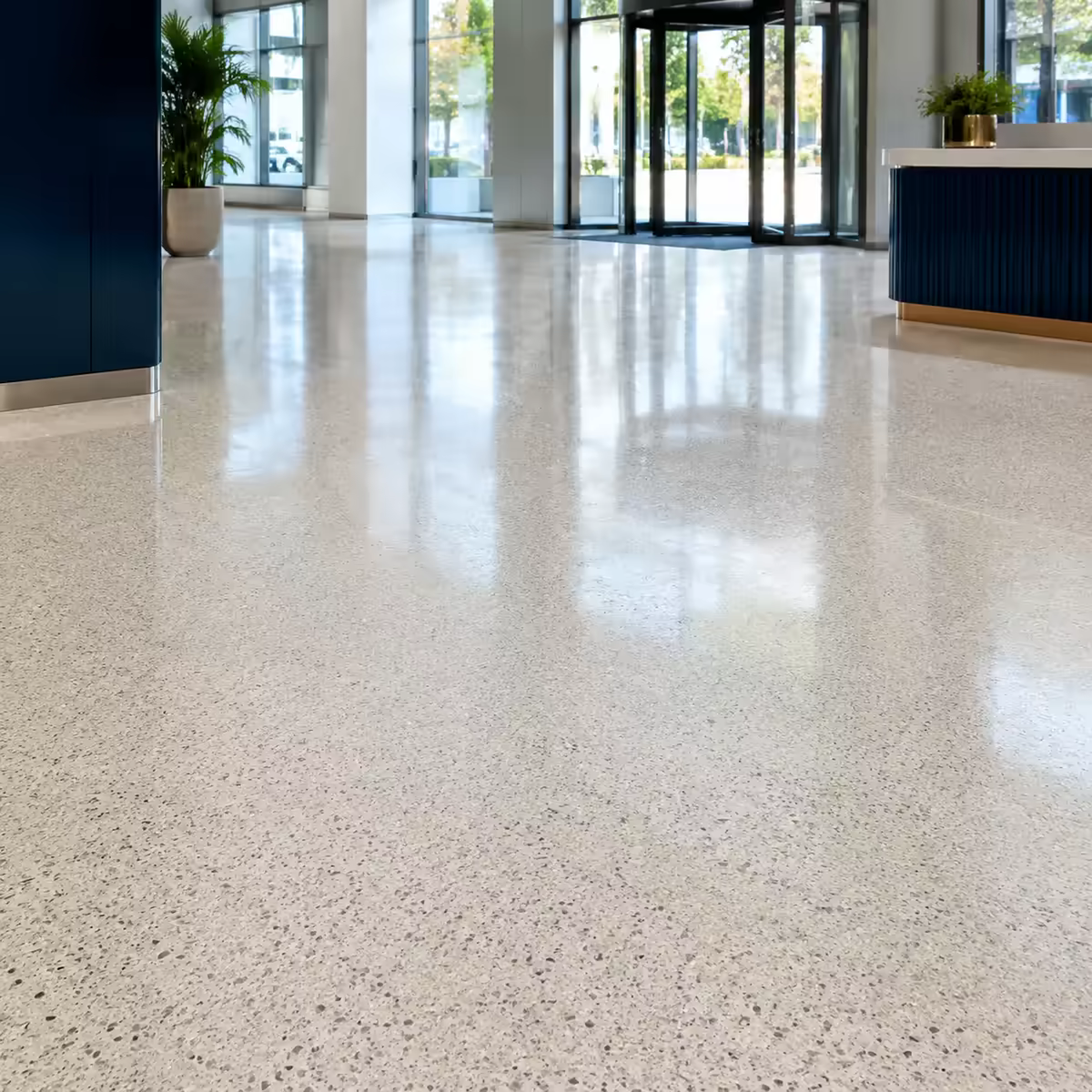 Example of a polished terrazzo floor in a bright commercial lobby